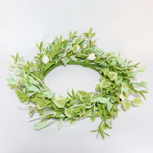 Artificial green leaf wreath with white buds and yellow berries for home wall decoration