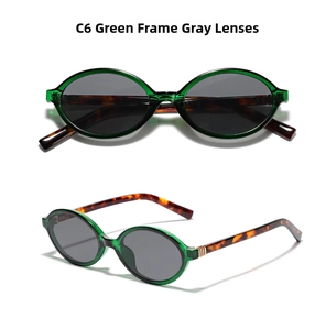 Detail view of oval C6 green frames with gray lenses and tortoiseshell patterned temples