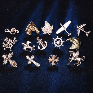 Set of 14 classic gold and silver metal lapel pins featuring maple leaf and airplane designs