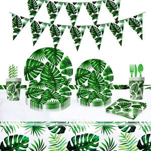 Hawaiian tropical leaf party tableware set with paper plates, cups, and napkins on white background