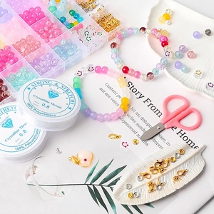 DIY jewelry making kit with 24-grid crystal beads, elastic threads, and crafting tools