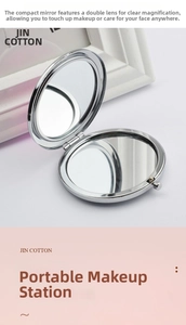 Detail view of the 2x magnification mirror on the portable metal folding makeup mirror