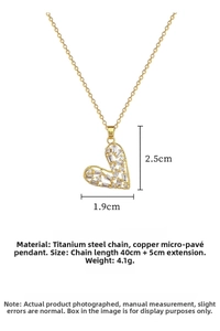 Detailed spec sheet of gold hollow heart necklace with clear cubic zirconia in titanium steel