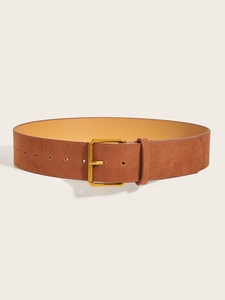 Close-up of vintage brown suede wide belt with polished gold square buckle detail