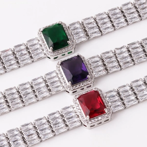 Luxurious wide bracelet with emerald cut colorful zircons and silver metal setting