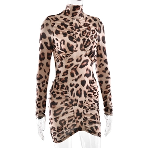 Detail showing leopard print texture and pleated fabric on long sleeve bodycon dress