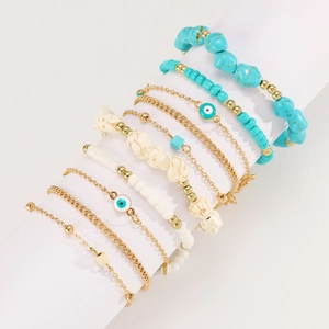 Set de 8 pulseras bohemias con ojo turco, cuentas turquesas y cadenas doradas