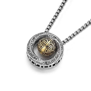 Mens Mobius ring pendant necklace in silver and gold with intricate fretwork engraving
