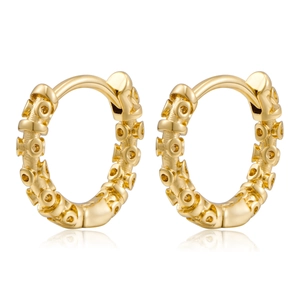 Detailed view of gold hoop earrings with unique embossed octopus sucker texture on metal