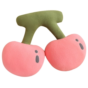 Plush cherry pillow toy with cute embroidered expression and soft green leaves