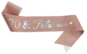 Close-up of rose gold glitter sash with 70 and Fabulous holographic lettering