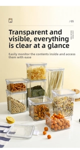 Detail of airtight food storage containers with white lids for grains and snacks