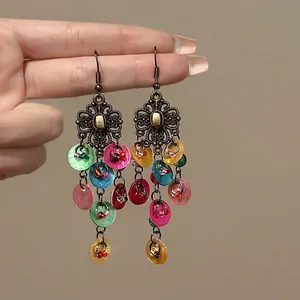 Bohemian vintage long tassel earrings with colorful shell pendants and gold metal motifs