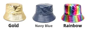 Close-up of shiny bucket hats in gold, navy blue, and rainbow gradient waterproof fabric