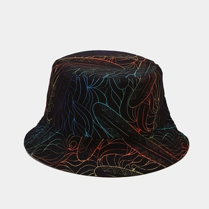 Detailed macro view of black bucket hat with colorful gradient abstract geometric pattern