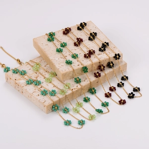 Minimalist daisy flower necklaces with colorful crystal beads on gold-plated chains