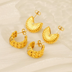 Golden heart-shaped stud earrings with shell texture and pave crystals for women