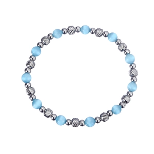 Detailed top view of light blue cat-eye beads and spiral silver metal textured beads