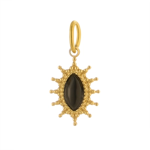 Detailed macro view of a gold starburst pendant featuring an oval black gemstone inlay