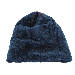 Close-up of the thick dark blue faux fur lining on a warm winter knitted beanie cap