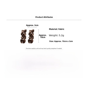 Detail view of leopard print fabric flower earrings with size and weight dimensions