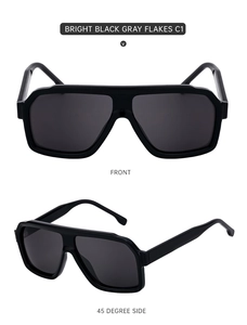Close-up of square frame sunglasses in bright black finish with grey lenses and pin temples