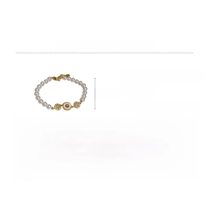 Détails du bracelet perles plaqué or 18k avec breloque œil en zircon et chaîne réglable