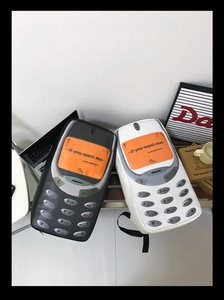 Detail of unique Nokia phone style backpack with creative screen text and buttons
