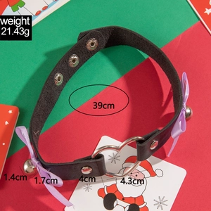 Detail view of leather choker with silver heart ring, purple bow and bell showing dimensions