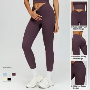High-waisted yoga leggings in purple featuring a crossover waistband and lifting seam