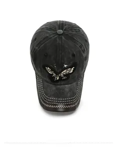 Top view of washed denim baseball cap featuring eagle embroidery and star details