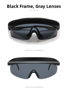 Close-up of black frame gray lenses on oversized shield sunglasses for cycling