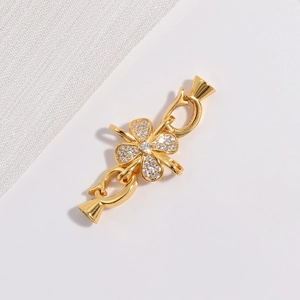 S925 silver four-leaf clover connector clasp with sparkling zircons and gold finish