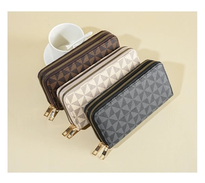 Three long double-zipper wallets in brown beige and gray with geometric patterns