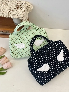 Polka dot travel toiletry bag with 3D plush wings and sturdy handles for women