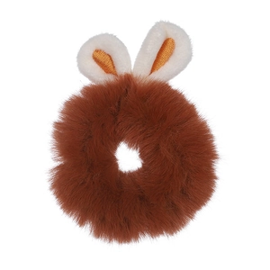 Detailed view of a soft brown plush scrunchie featuring cute white and orange bunny ears