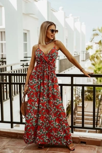 Outdoor shot of bohemian V-neck floral maxi dress with elegant high waist cut
