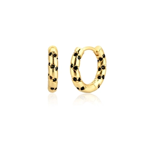 Macro detail of gold hoop earrings with black enamel dots and S925 silver stamp