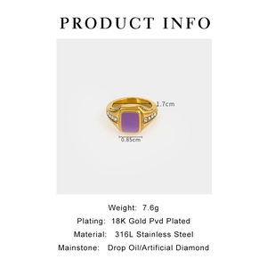 Detail showing 18K gold PVD coated stainless steel ring with purple enamel and crystals