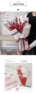 Close-up of vintage Christmas kraft paper with Santa Claus prints for flower wrapping