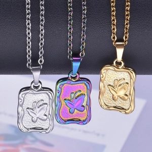 Three stainless steel butterfly pendant necklaces in silver, gold and rainbow finish