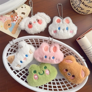 Plush animal keychains featuring rabbit, bear, and frog icons for bags and gifts