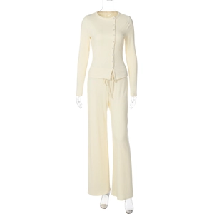 Detail of light yellow ribbed knit loungewear set with button cardigan and drawstring pants