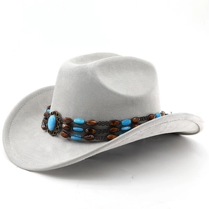 Detail of light gray suede cowboy hat featuring vintage beaded band and blue turquoise stone