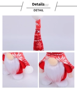 Close-up detail of knitted Santa gnome hat with snowflake pattern and plush beard