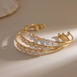 Three-piece 18k gold plated open bangles with heart and round zircon stones