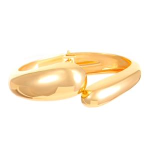 Polished gold minimalist wide open cuff bracelet with a thick geometric spring design