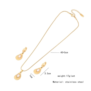 Detailed view of gold stainless steel necklace and teardrop pearl earrings with measurements