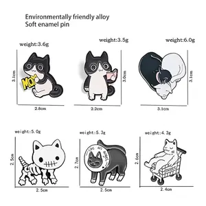 Cartoon cute cat enamel pins showing size details for cat reading and cat in cart