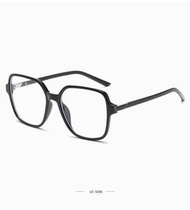 Dettaglio montatura occhiali poligonale nera lucida con eleganti accenti metallici